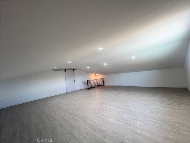 54279 Bautista Canyond Rd, Anza, CA 92539 - additional living space with lofted ceiling, wood finished floors, and recessed lighting