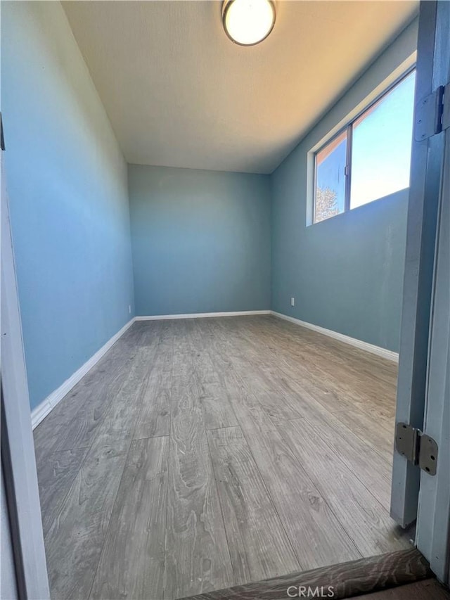 54279 Bautista Canyond Rd, Anza, CA 92539 - spare room featuring wood finished floors and baseboards