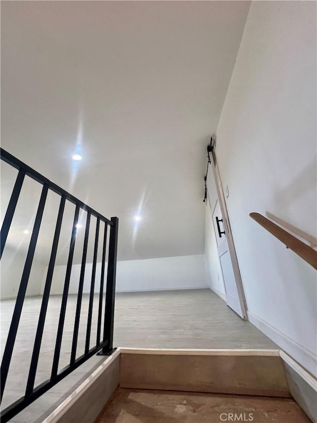 54279 Bautista Canyond Rd, Anza, CA 92539 - staircase with a barn door and lofted ceiling