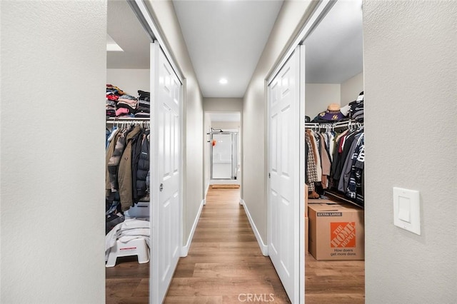 3094 Crooked Branch Way, San Jacinto, CA 92582 - hall featuring wood finished floors and recessed lighting