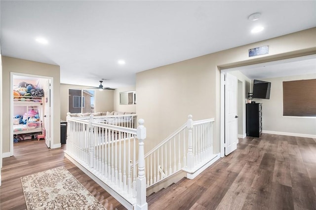 3094 Crooked Branch Way, San Jacinto, CA 92582 - hall featuring an upstairs landing, wood finished floors, and recessed lighting