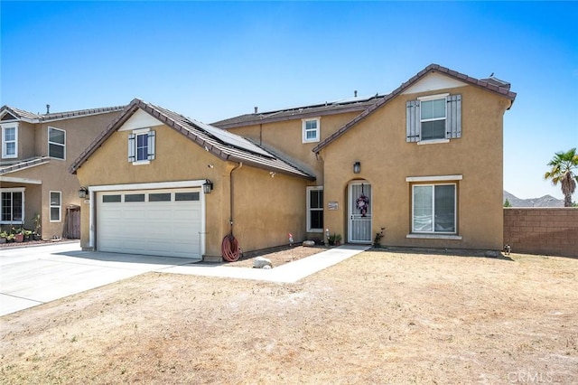 3094 Crooked Branch Way, San Jacinto, CA 92582 - traditional-style house featuring roof mounted solar panels, stucco siding, driveway, and an attached garage