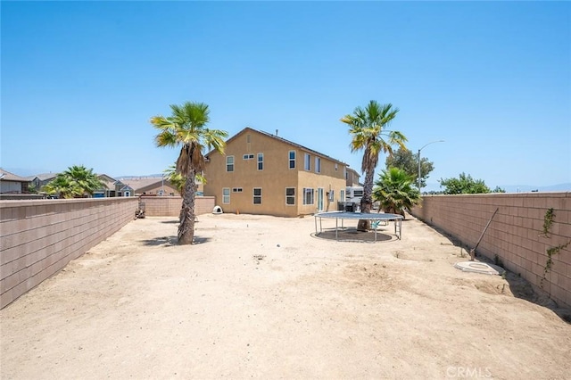 3094 Crooked Branch Way, San Jacinto, CA 92582 - fenced backyard with a trampoline