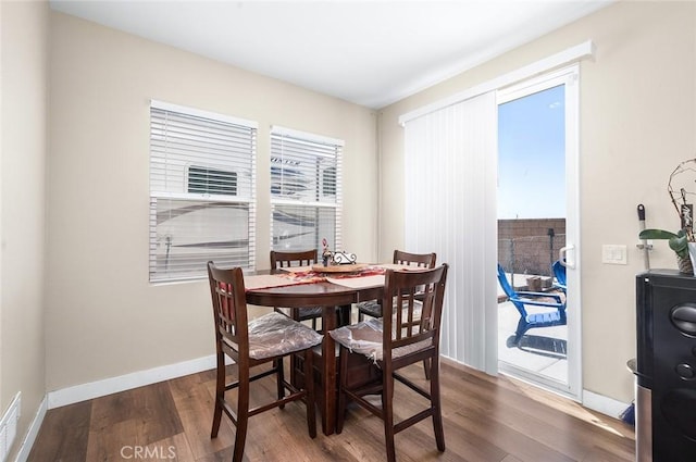 3094 Crooked Branch Way, San Jacinto, CA 92582 - dining room with dark wood-type flooring and baseboards