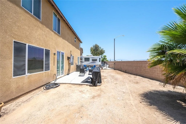 3094 Crooked Branch Way, San Jacinto, CA 92582 - fenced backyard with a patio