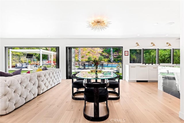 19258 Berclair Ln, Tarzana, CA 91356 - dining area featuring light wood finished floors and recessed lighting