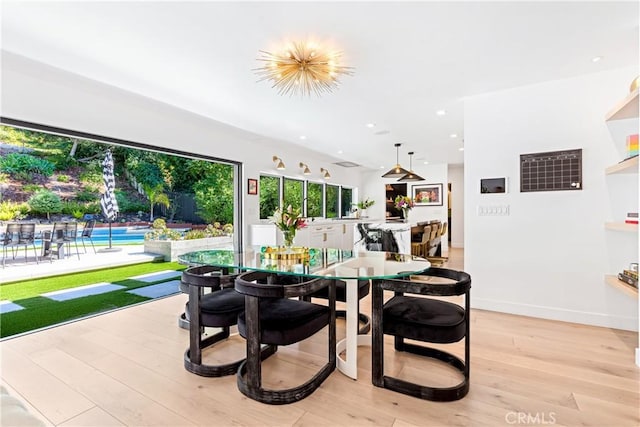 19258 Berclair Ln, Tarzana, CA 91356 - dining room featuring light wood-style flooring and recessed lighting