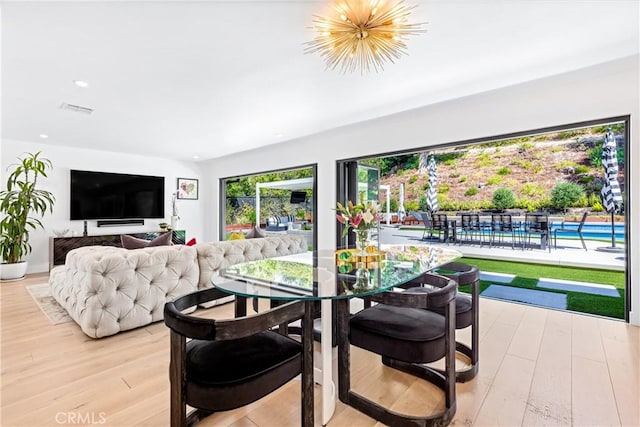 19258 Berclair Ln, Tarzana, CA 91356 - living area featuring light wood-type flooring and recessed lighting