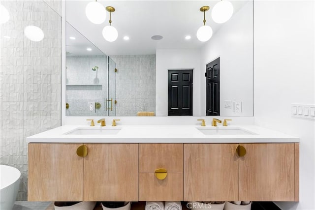 19258 Berclair Ln, Tarzana, CA 91356 - full bath with double vanity, a stall shower, a freestanding tub, and tile walls
