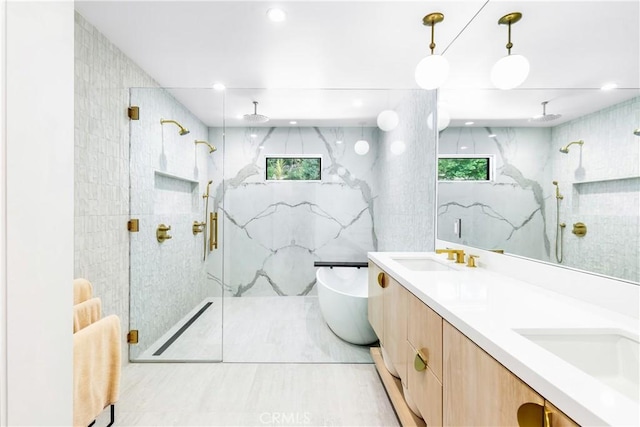 19258 Berclair Ln, Tarzana, CA 91356 - bathroom with a marble finish shower, double vanity, a freestanding bath, and tile walls