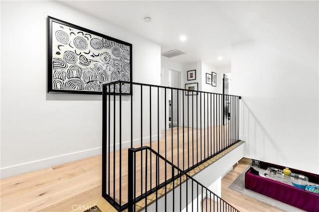 19258 Berclair Ln, Tarzana, CA 91356 - staircase with wood finished floors and recessed lighting