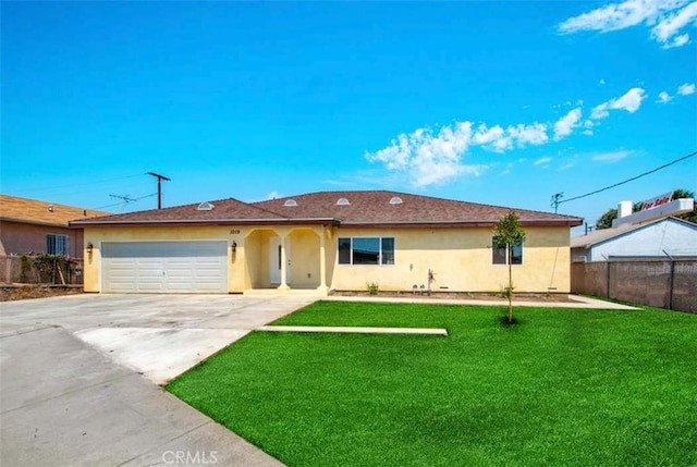 1019 W Arbutus St, Compton, CA 90220 - ranch-style house with stucco siding, concrete driveway, and an attached garage