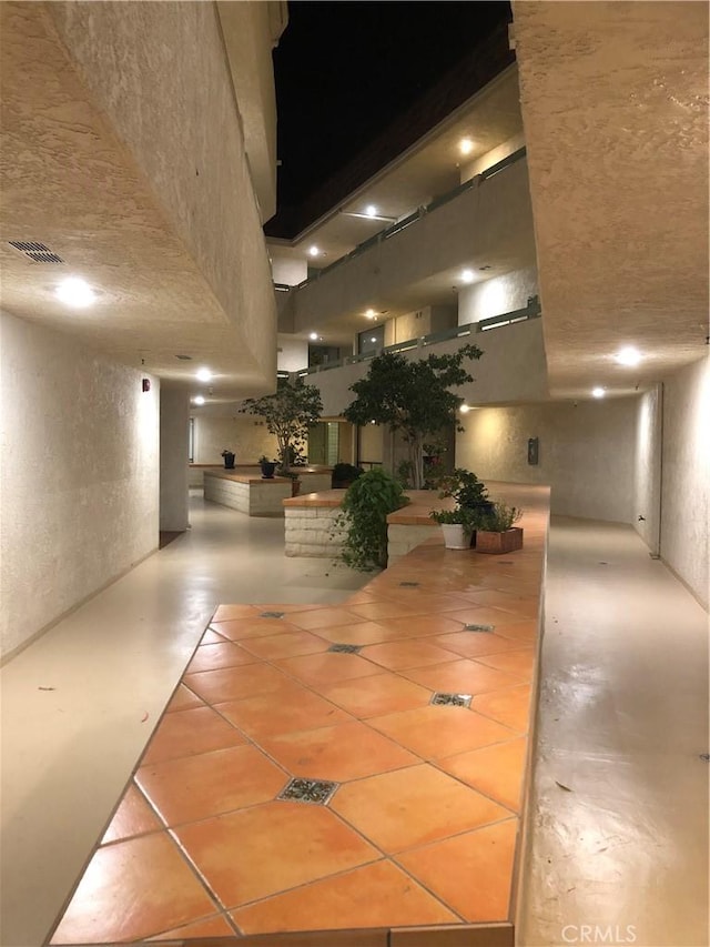 2545 Via Campesina Unit 102, Palos Verdes Estates, CA 90274 - building lobby with a textured wall