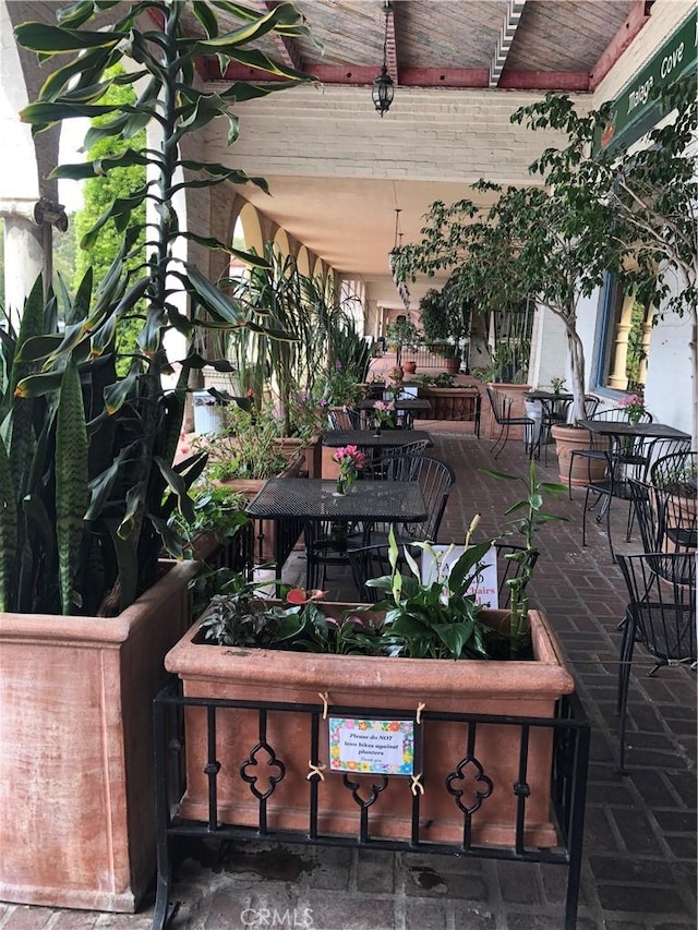 2545 Via Campesina Unit 102, Palos Verdes Estates, CA 90274 - view of patio featuring outdoor dining area
