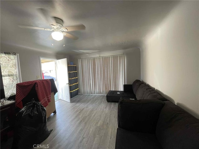 9051 Walker St, Cypress, CA 90630 - living area with wood finished floors and ceiling fan