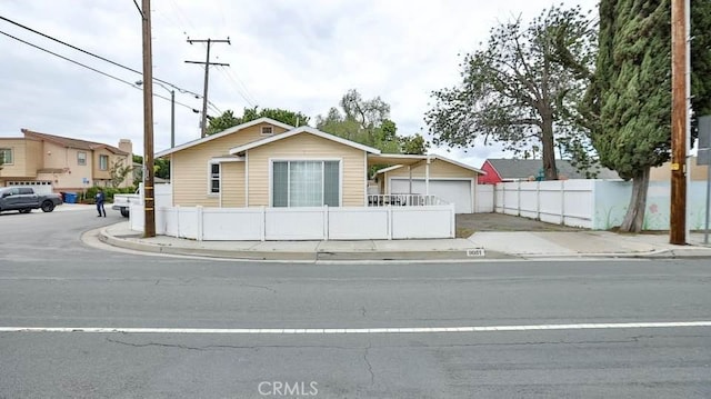 9051 Walker St, Cypress, CA 90630 - view of front of house featuring concrete driveway
