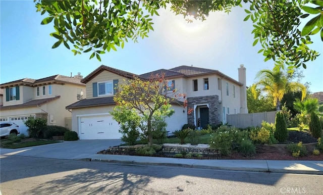 26523 Starling Ct, Canyon Country, CA 91387 - traditional-style house with driveway, an attached garage, stone siding, stucco siding, and a chimney