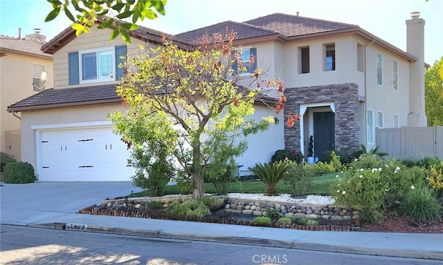 26523 Starling Ct, Canyon Country, CA 91387 - traditional-style house featuring an attached garage, stone siding, a chimney, and stucco siding