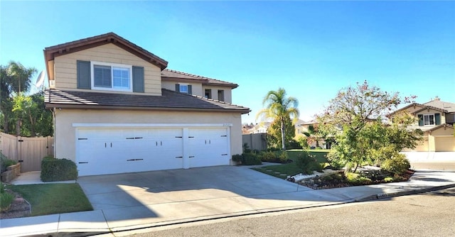 26523 Starling Ct, Canyon Country, CA 91387 - traditional-style house featuring driveway, stucco siding, and a tiled roof