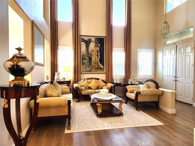 26523 Starling Ct, Canyon Country, CA 91387 - living room with a high ceiling and wood finished floors