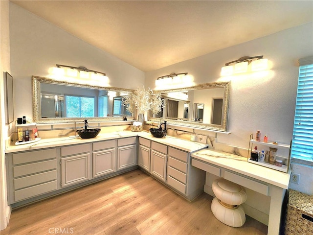 26523 Starling Ct, Canyon Country, CA 91387 - full bath featuring wood finished floors, lofted ceiling, and vanity