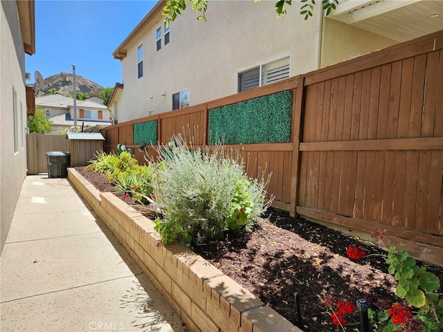 26523 Starling Ct, Canyon Country, CA 91387 - view of side of property with a fenced backyard and stucco siding