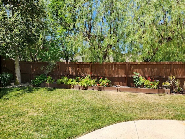 26523 Starling Ct, Canyon Country, CA 91387 - fenced backyard featuring a vegetable garden