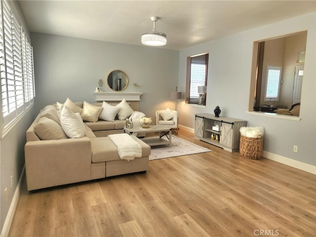 26523 Starling Ct, Canyon Country, CA 91387 - living room featuring wood finished floors