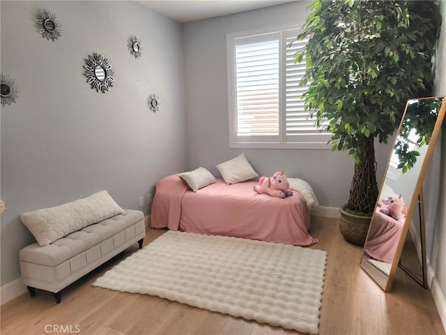 26523 Starling Ct, Canyon Country, CA 91387 - bedroom with wood finished floors and baseboards