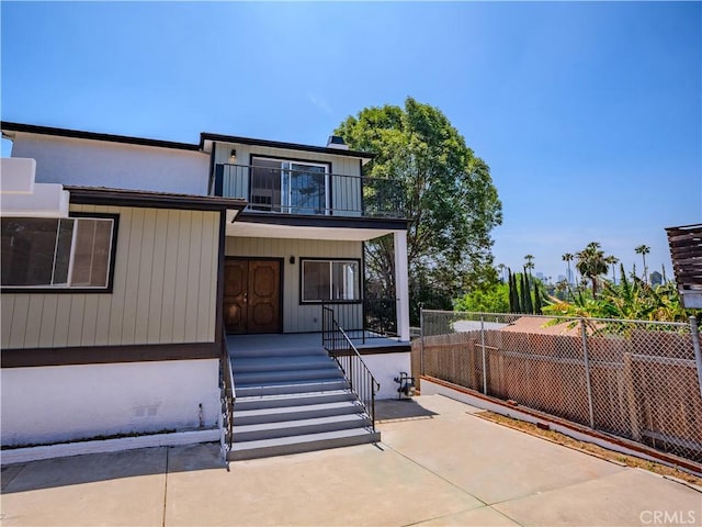 1522 N Benton Way, Los Angeles, CA 90026 - modern home with a balcony, crawl space, and a porch