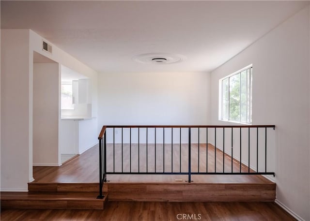 1522 N Benton Way, Los Angeles, CA 90026 - stairs featuring wood finished floors and baseboards