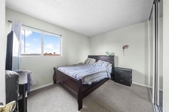 1861 Katella St, San Diego, CA 92154 - bedroom featuring carpet flooring and a textured ceiling