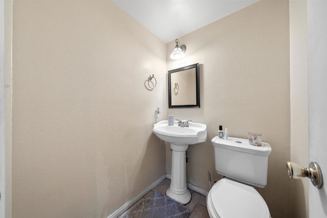 1861 Katella St, San Diego, CA 92154 - half bath with toilet and tile patterned floors