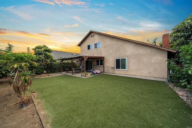 1861 Katella St, San Diego, CA 92154 - rear view of house featuring a fenced backyard, stucco siding, a patio area, and a chimney