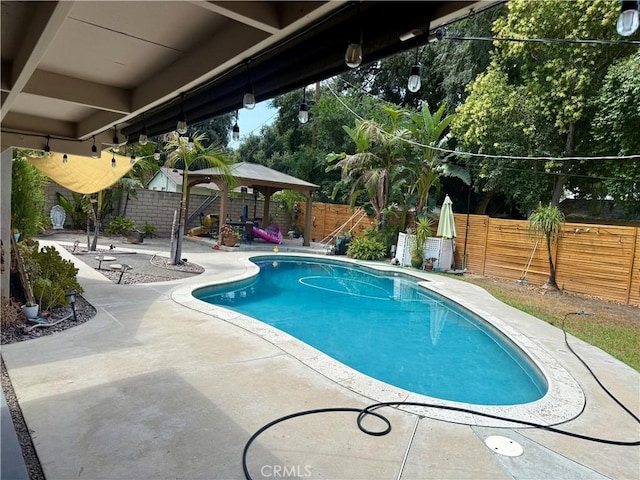 8514 Hickory Ln, Riverside, CA 92504 - view of pool featuring a patio area, a fenced backyard, and a gazebo
