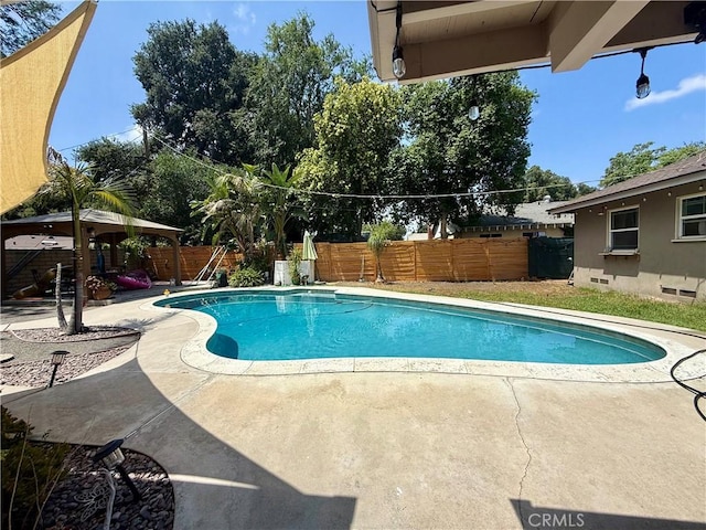 8514 Hickory Ln, Riverside, CA 92504 - view of pool featuring a fenced backyard, a patio area, and a gazebo