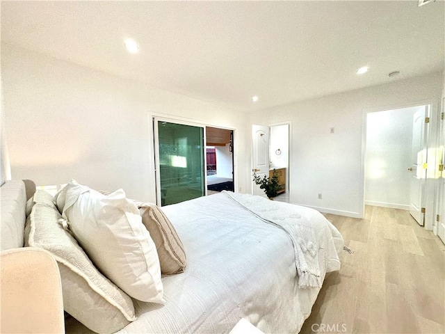 10335 Babbitt Ave, Granada Hills, CA 91344 - bedroom featuring light wood-style floors and recessed lighting