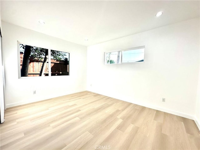 10335 Babbitt Ave, Granada Hills, CA 91344 - spare room with wood finished floors and recessed lighting