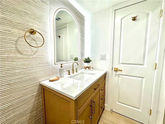 10335 Babbitt Ave, Granada Hills, CA 91344 - bathroom featuring vanity and wood finished floors