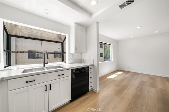 5510 Las Virgenes Rd, Calabasas, CA 91302 - kitchen featuring black dishwasher, white cabinets, light wood-type flooring, light countertops, and recessed lighting
