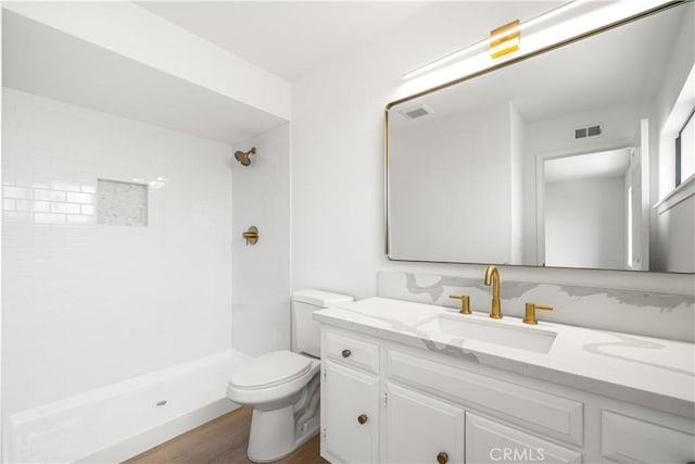 5510 Las Virgenes Rd, Calabasas, CA 91302 - bathroom featuring wood finished floors, vanity, and a shower