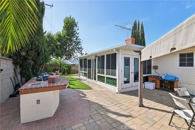2148 W Houston Ave, Fullerton, CA 92833 - view of patio / terrace featuring french doors and a sunroom