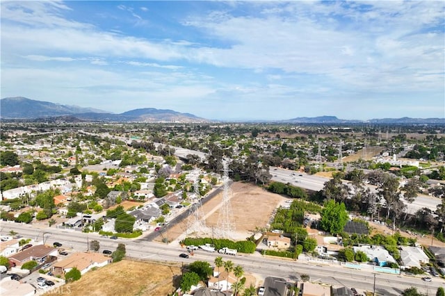 15018 Mankato St, Mission Hills San Fernando, CA 91345 - aerial overview of property's location with mountains and nearby suburban area
