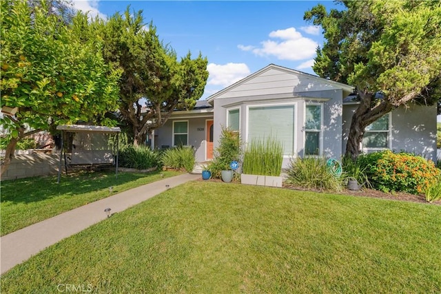 15018 Mankato St, Mission Hills San Fernando, CA 91345 - view of front of house with a front lawn and stucco siding