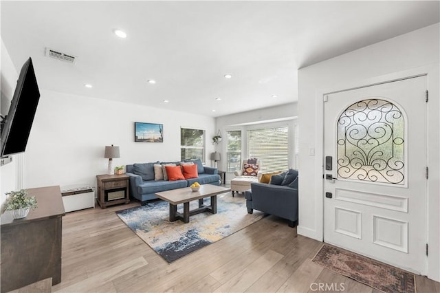 15018 Mankato St, Mission Hills San Fernando, CA 91345 - living area featuring light wood-type flooring and recessed lighting