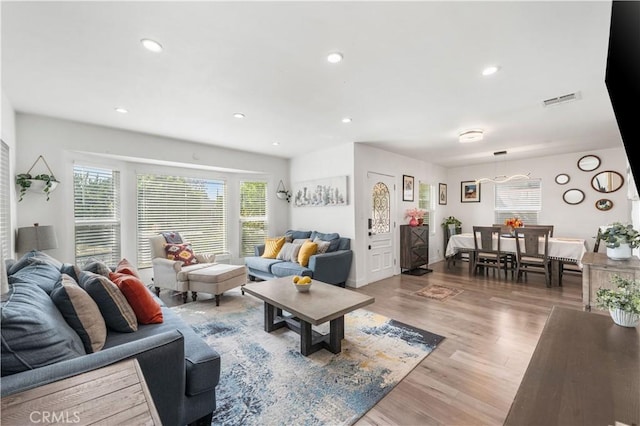 15018 Mankato St, Mission Hills San Fernando, CA 91345 - living room featuring wood finished floors and recessed lighting