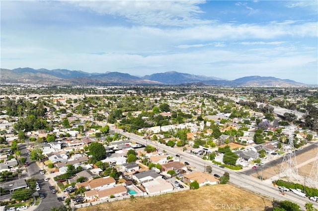 15018 Mankato St, Mission Hills San Fernando, CA 91345 - aerial overview of property's location with a mountainous background and nearby suburban area