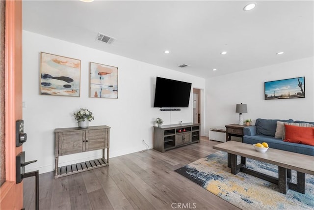 15018 Mankato St, Mission Hills San Fernando, CA 91345 - living area featuring wood finished floors and recessed lighting