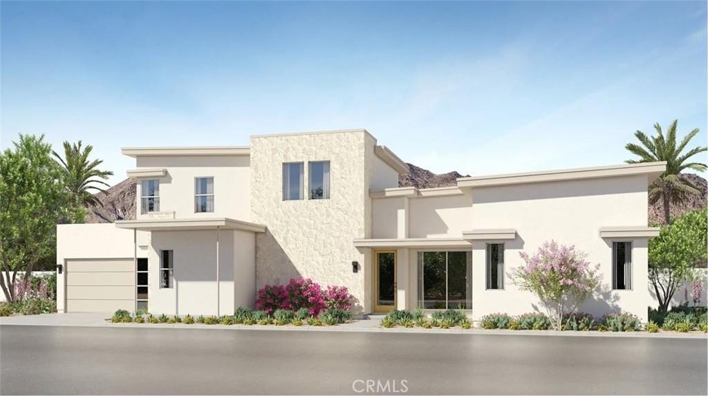 2648 Bandit Ln, Palm Springs, CA 92264 - view of front of property with stucco siding and driveway