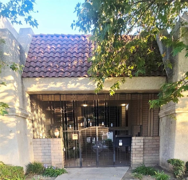 21000 Parthenia St Unit 6, Canoga Park, CA 91304 - entrance to property featuring a gate and a tile roof